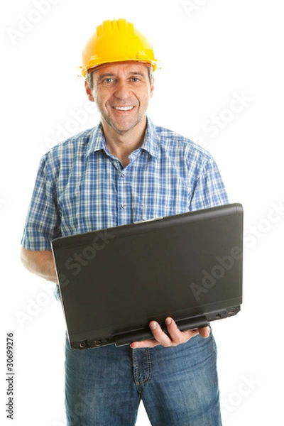 Obraz Worker wearing hard hat and using leptop