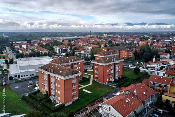 Fototapeta aerial view of torino Turin in autumn with the mountains and clouds at the horizon