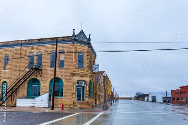 Obraz Beautiful limestone buildings  from the late 1880s still form the core of rural downtown Jetmore, Kansas.