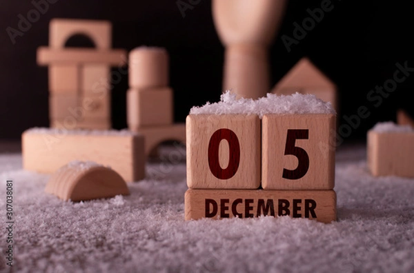 Obraz December 5 written with wooden blocks