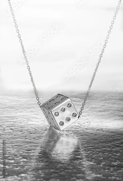 Obraz On metallic floor, a backgammon dice  necklace