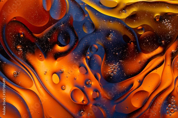 Fototapeta Close-up water and oil abstract in a rainbow lighting effect