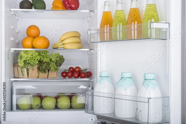 Obraz Open fridge full of fresh fruits and vegetables