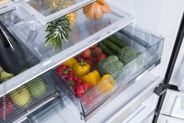 Obraz Open fridge full of fresh fruits and vegetables