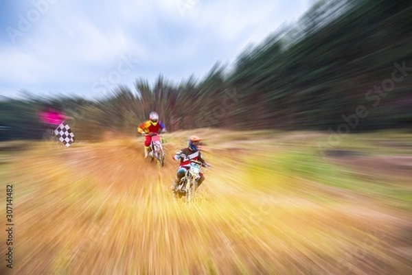 Obraz   Motocross rider on a practice field . Front View Shot of the Professional Motocross .  Dirt Track. 