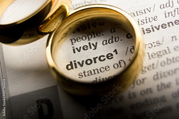 Obraz Divorce and separation concept. Two golden wedding rings. Dictionary definition
