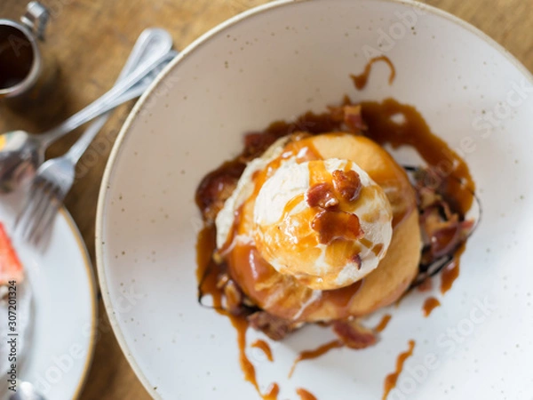 Fototapeta Donut Topped with Bacon and Ice Cream