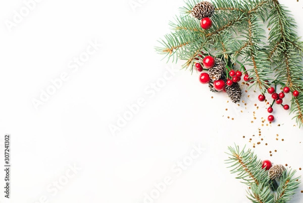 Obraz Christmas composition on a white background. Top view with copy space