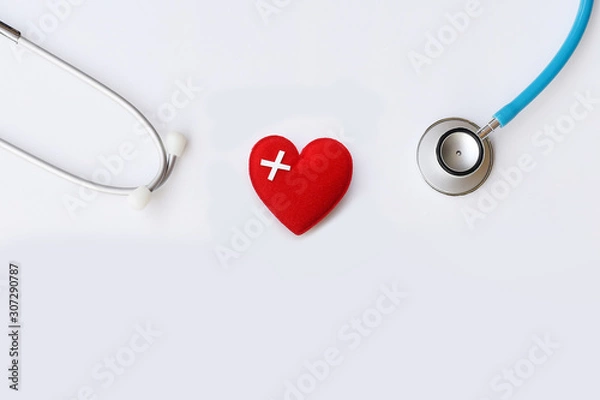 Fototapeta Red heart with stethoscope isolated on white background