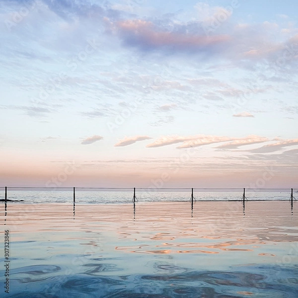 Obraz Ocean sunset in pink and blue. Sea view background. Beach wallpaper