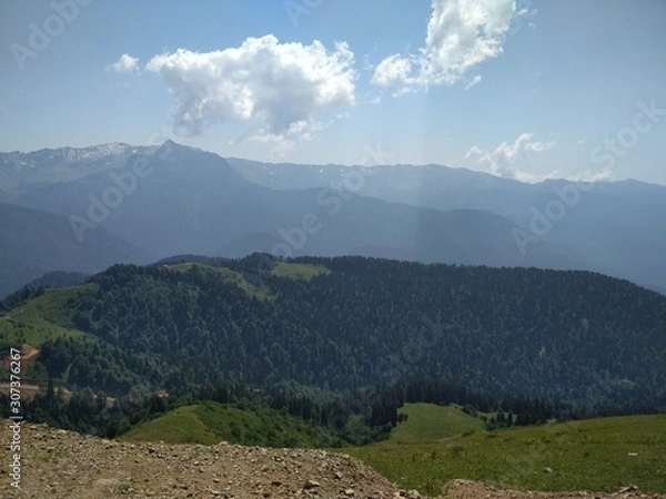 Fototapeta landscape with mountains and clouds