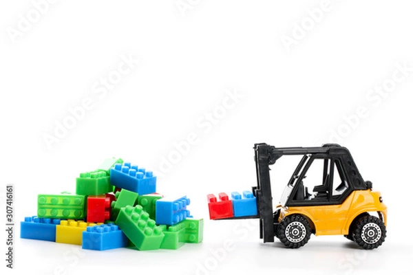 Obraz Plastic toy block over white background