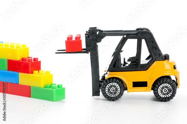 Obraz Plastic toy block over white background