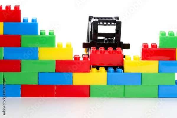Obraz Plastic toy block over white background