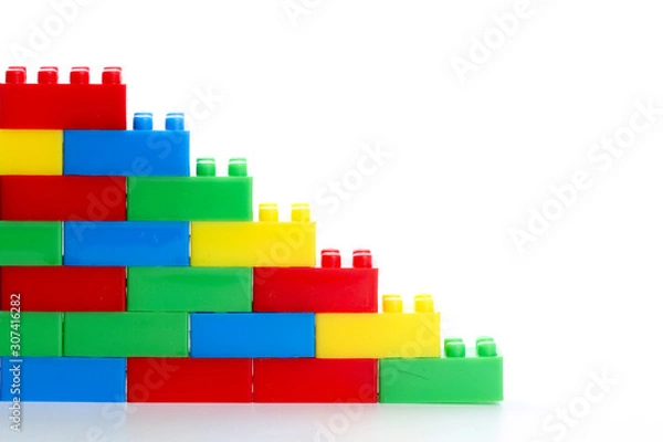 Fototapeta Plastic toy block over white background