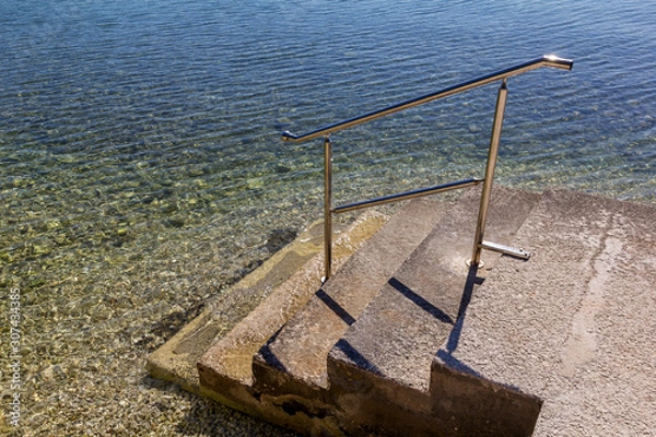 Fototapeta Steps into the beach