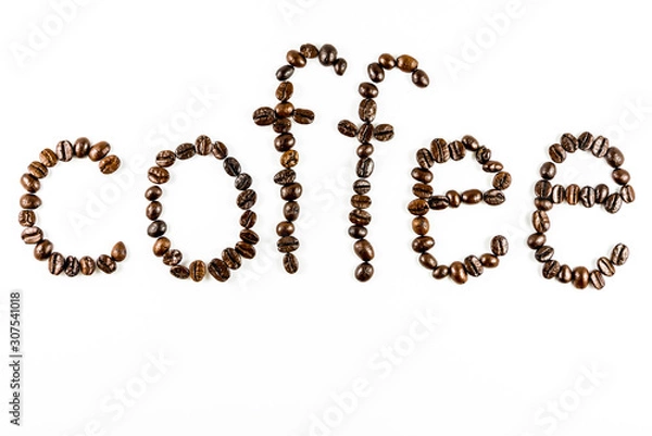 Obraz Coffee beans are stacked in word coffee. Isolated on white background