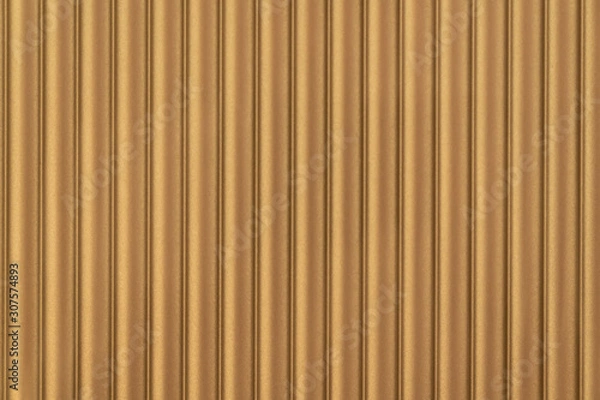 Fototapeta Close up seamless corrugated wall covering in gold color / architecture / seamless pattern / wallpaper concept / metallic texture