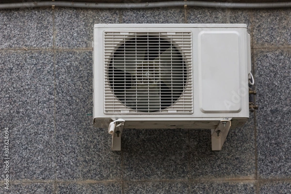 Fototapeta Air conditioning on the wall of the building. Air conditioning cooling.