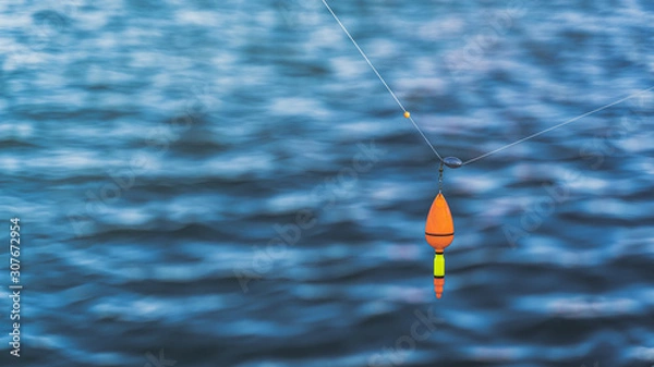 Fototapeta red bait from fishing pole