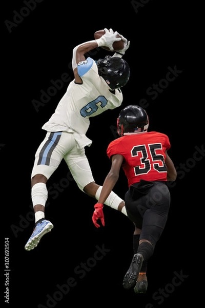 Fototapeta Great action photos of high school football players making amazing plays during a football game