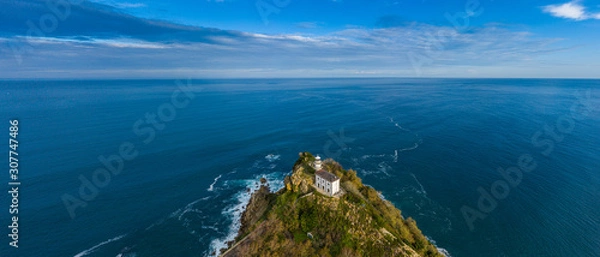 Fototapeta Getaria lighthouse in Gipuzkoa, Basque country - drone aerial view 21:9