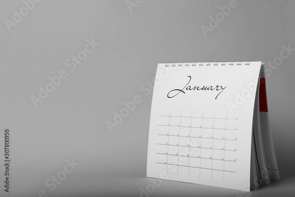 Fototapeta Paper calendar on grey background, space for text. Planning concept