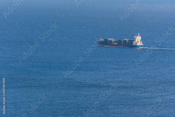 Fototapeta Ship transporting cargo containers.