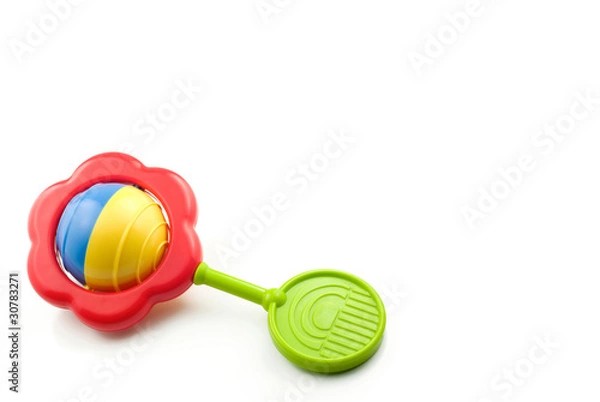 Fototapeta Baby Rattle On White Background