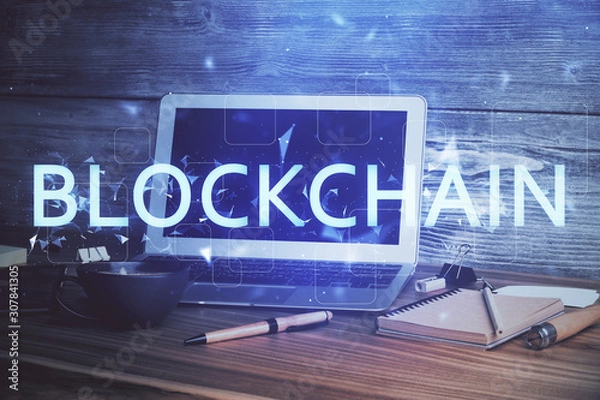 Fototapeta Multi exposure of blockchain theme hologram and table with computer background. Concept of bitcoin crypto currency.
