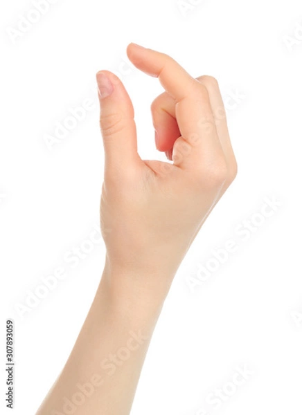 Fototapeta Woman hand with gesture like enlarging the picture on tablet PC screen