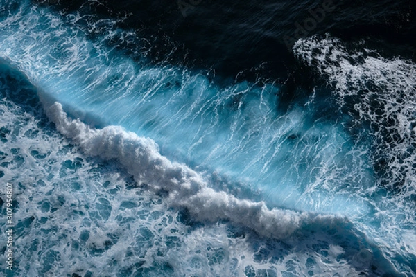 Obraz Aerial view to waves in ocean Splashing Waves. Blue turbid wavy sea water. Bali, Indonesia.