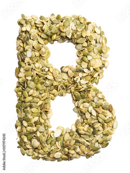 Fototapeta Letter B of the English alphabet from pumpkin seeds on a white isolated background. Food pattern made from seeds. Bright alphabet for shops.