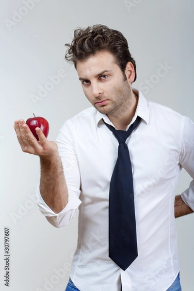 Fototapeta man holding red apple