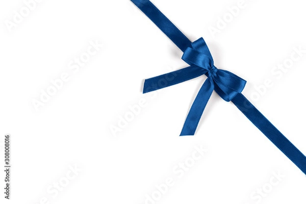 Fototapeta Shiny blue silk ribbon isolated on white background. Festive concept. Flat lay.