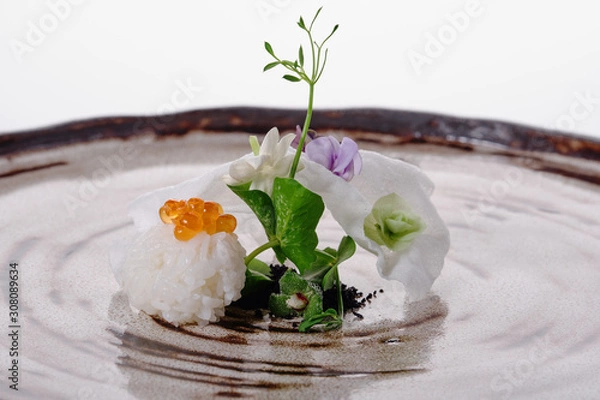 Obraz Rice with caviar on a white background