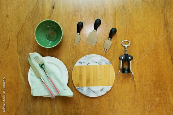 Obraz  Table set with crockery and kitchen elements