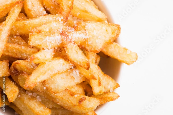 Fototapeta Bowl of potatoe fries on a white background