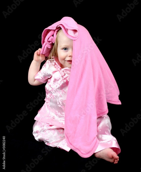 Obraz cute little girl hiding under her blanket