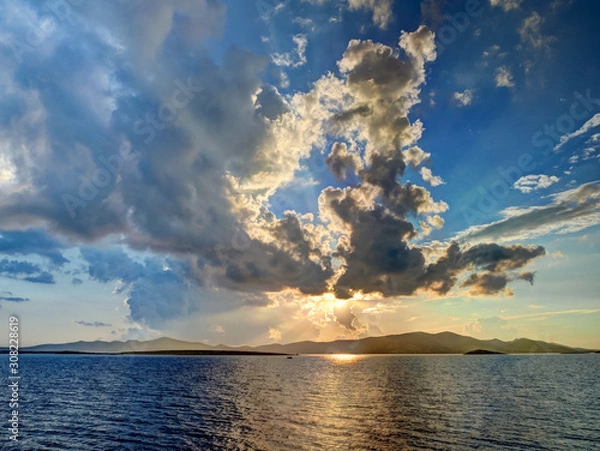 Obraz Antiparos sunset, colorful cloudy twilight sky  at the Aegean Sea, Greece Europe