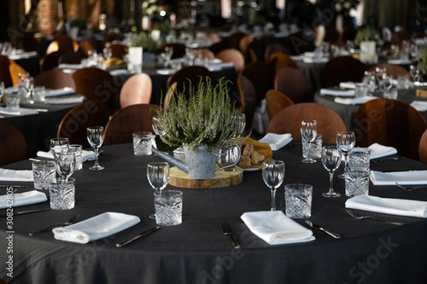 Fototapeta Food served on round table in a white hall during a Birthday corporate party in Eastern European Baltic Riga Latvia - Wooden ambar hall in countryside style - Canape, snacks and light drinks