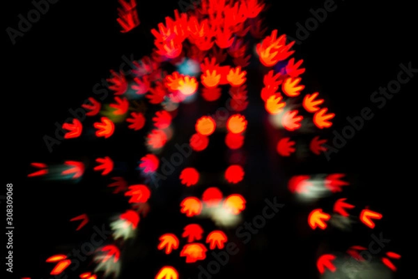 Fototapeta Light bokeh colorful in nightlight on black background