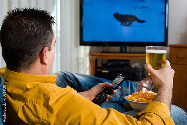 Fototapeta Watching television