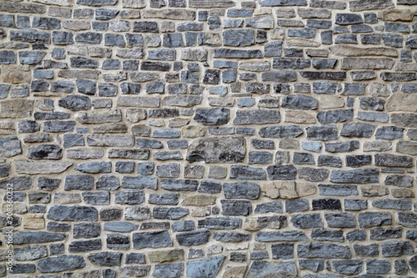 Fototapeta Stone wall texture. Gray stone wall background.