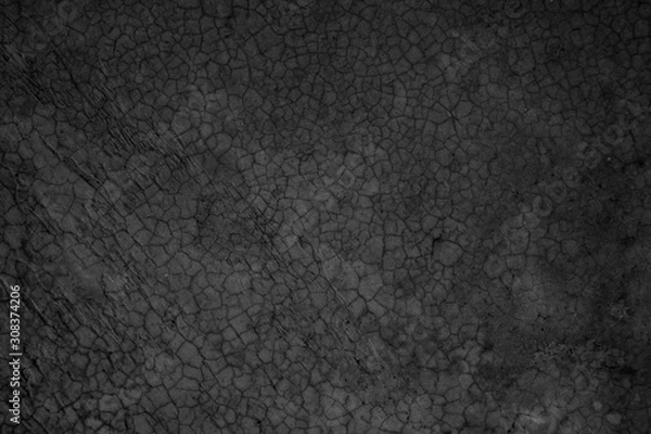 Fototapeta Art black concrete stone texture for background in black. Abstract color dry scratched surface wall cover colorful paper scratches shabby vintage Cement and sand grey dark detail covering.