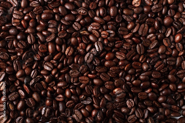 Fototapeta Background of coffee beans top view. 