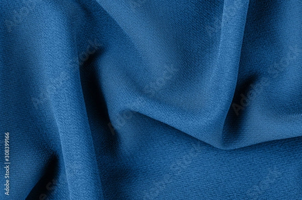 Fototapeta Monochrome decorative fabric in blue. Trend shade. Cloth backdrop. View from above. Copy space