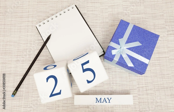 Fototapeta Calendar with trendy blue text and numbers for May 25 and a gift in a box.