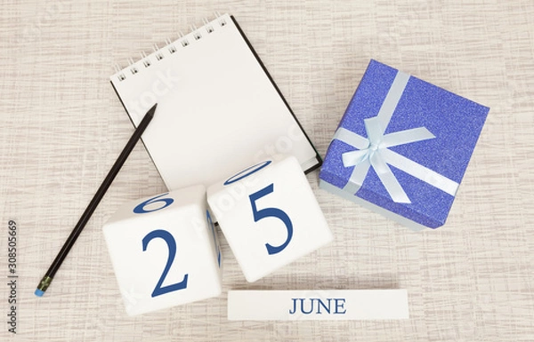 Fototapeta Calendar with trendy blue text and numbers for June 25 and a gift in a box.