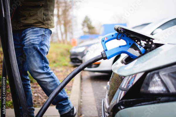 Obraz Elektroauto Laden beim Einkaufen